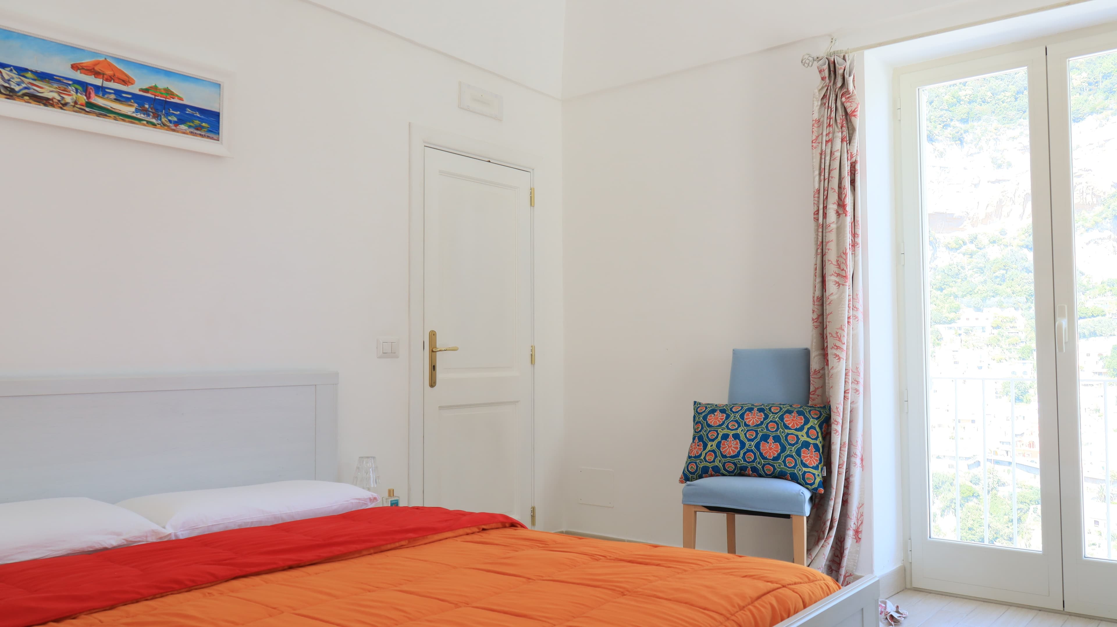 Elegant bedroom with sea view balcony